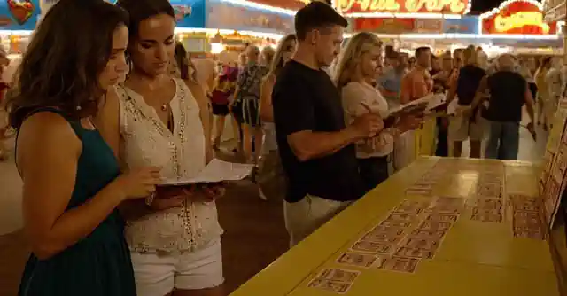 Interested customer selecting tickets for events while browsing different attractions in Arizona State Fair.