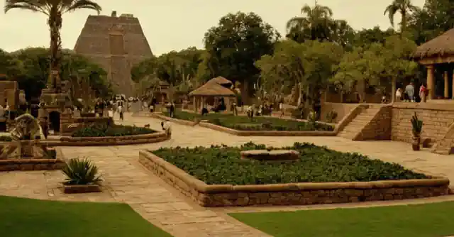 A bustling park in Scotts([scenery] depicting cultural elements unique to the Aztec heritage and modern amenities).