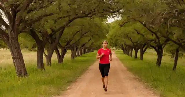 Individual jogging along the trail at Chaparrel Park in Scotts Red Bluff.