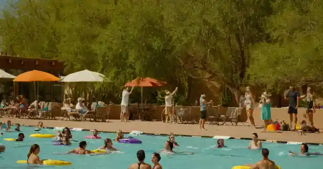 Several people participating in various water activities at The Clouds Aquatics Center in the Paseo del Descanso of Tempe.