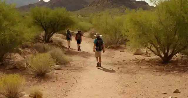 Hiking enthusiasts and kids embark on a scenic trail through diverse desert ecosystems in Phoenix, Arizona.