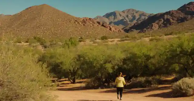 A person enjoying various recreational activities at the beautiful amenities within Estrella Mountain Regional Park.