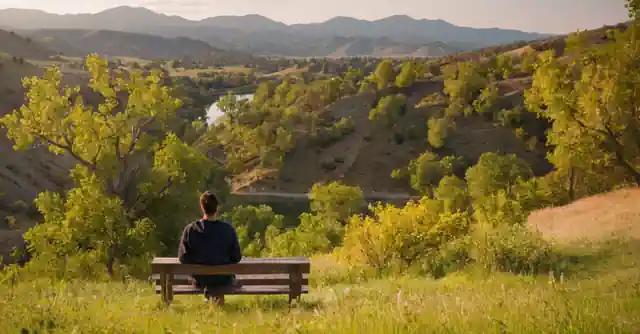Person enjoying time at the picturesque outdoor setting of Foothills Park.