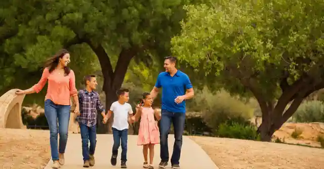 A family having fun on various attractions at the serene and picturesque Foothill Park.