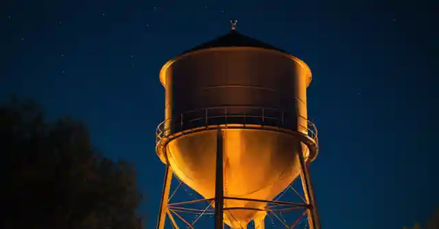Sketch depicting the Gilbert Water Tower with lights on it.