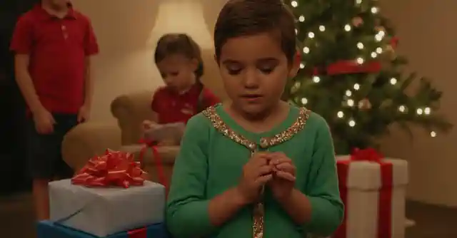 A child receiving a surprise gift at Surprises for kids in Glendale, Phoenix, Arizona.