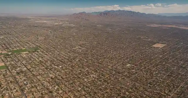 A colorful map highlighting neighborhoods in Gilbert, AZ with information about population density, proximity to Phoenix.