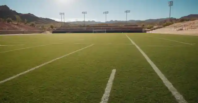 A vibrant football field under the sunny Arizonian sky.