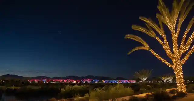Christmas lights illuminating the night sky over Salt River Fields in Scottsdale.