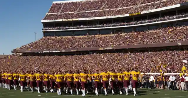 A printed schedule outlining the parades date and timing at Sun Devil Stadium in Scottsdale.