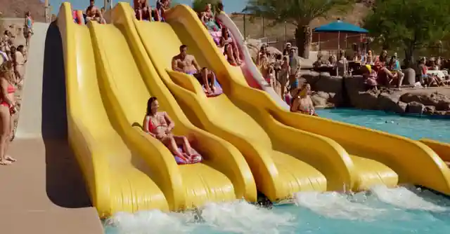Families enjoying water slides and attractions at Esquer Parks aquatic venue in Tempe.